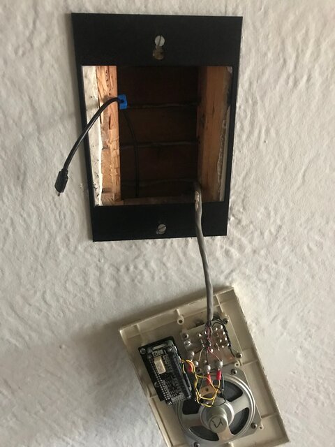 Test fitting the prototype in the wall cutout